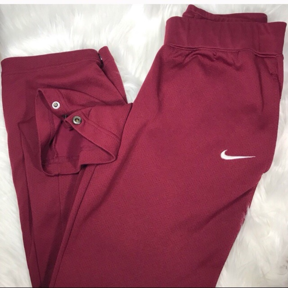 maroon Nike sweatpants